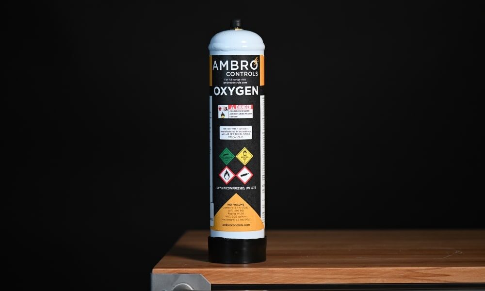 Ambro Controls 1L Oxygen Cylinder (1811323) on table